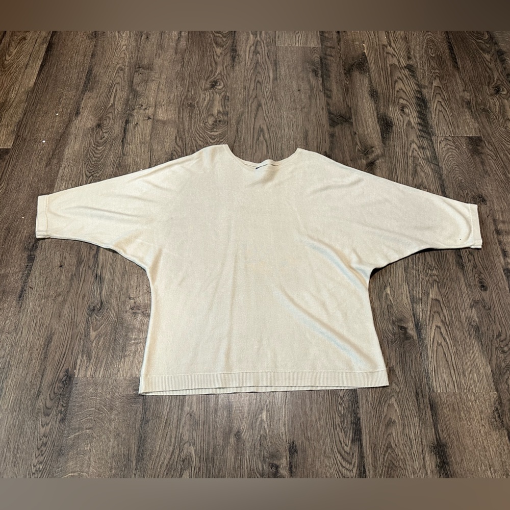 Women's size large, Soho New York and Company, cream colored sweater.